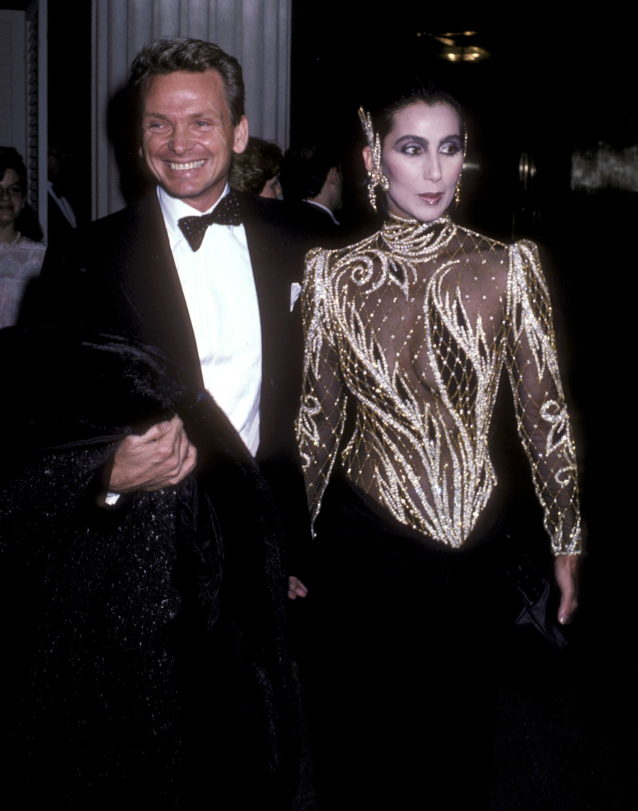 Bob Mackie and Cher attend the Metropolitan Museum's Costume Institute Gala Exhibition of "Costumes of Royal India" in New York City on December 9, 1985. 
