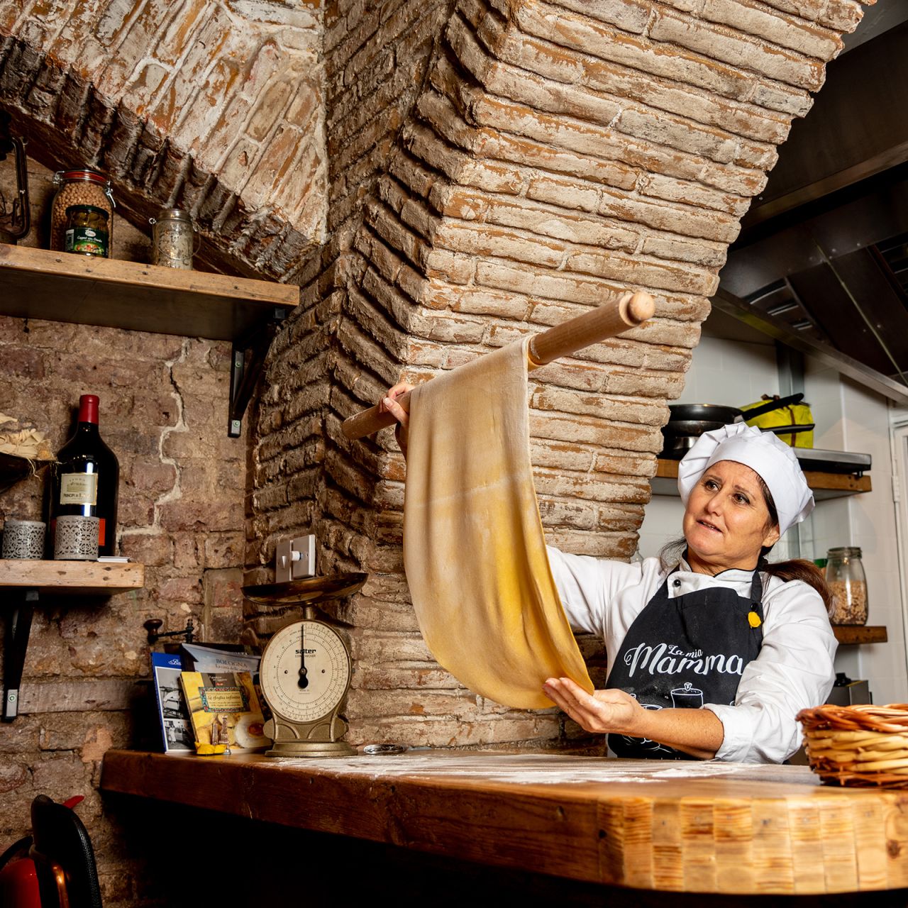 Mamma Emilia making pasta. Each mamma spends about three months working in the restaurant.