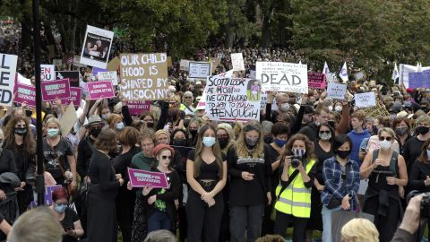 Demonstrators in Melbourne march in the wake of sexual assault allegation in Parliament, in March 2021. 