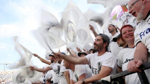 Frankfurt fans wave flags during the game.
