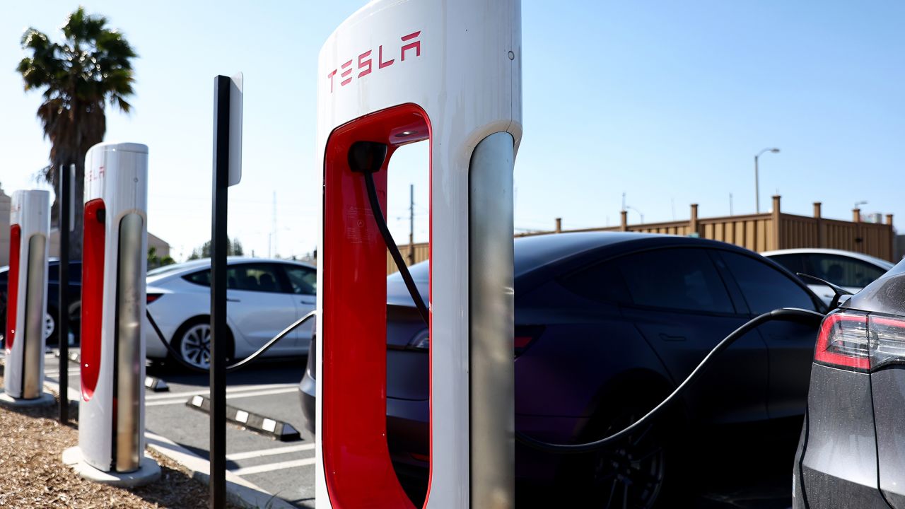 Tesla cars recharge at a Tesla Supercharger station on April 14, 2022 in Pasadena, California. 