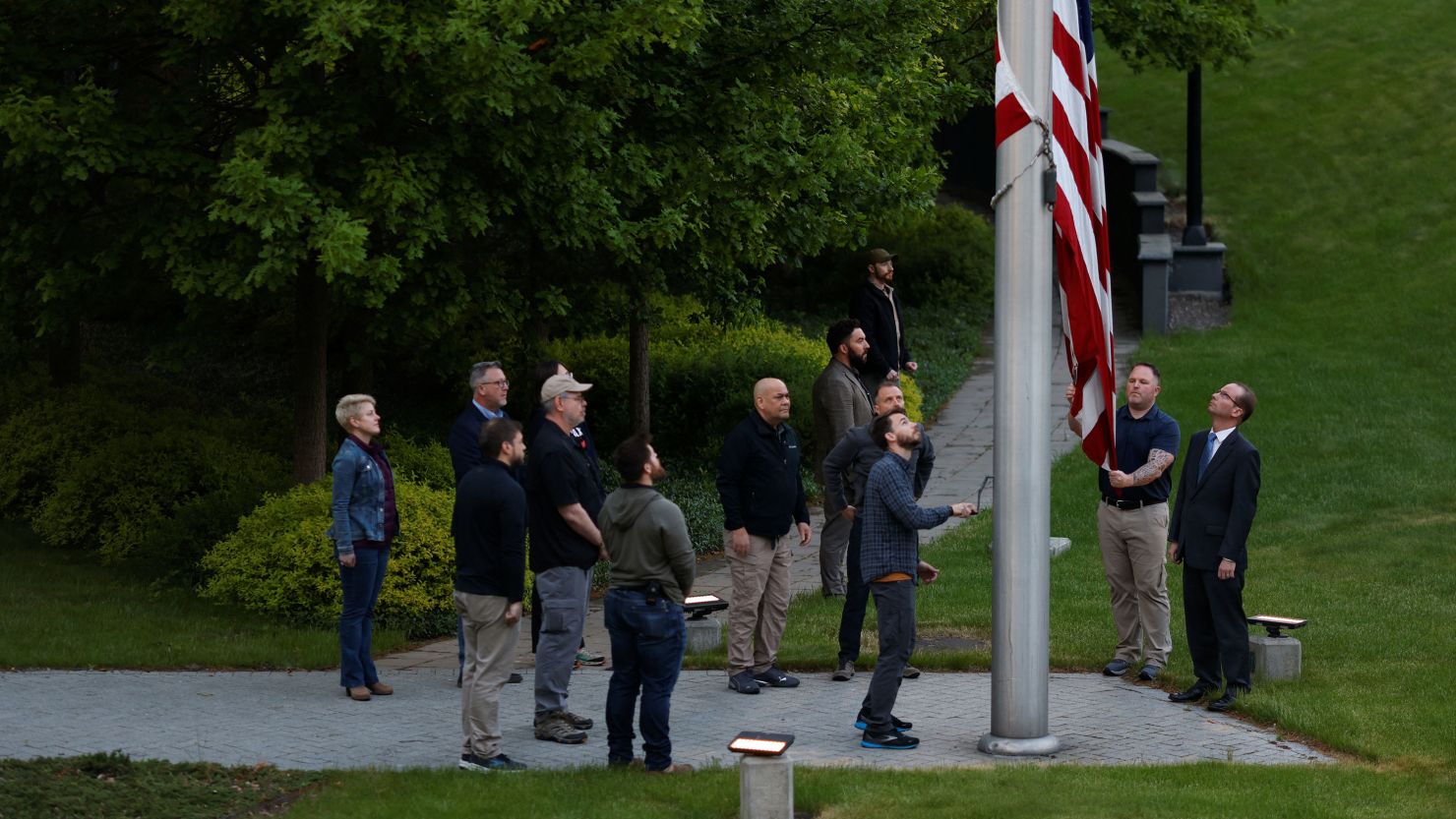 The US flag is raised for the first time after American diplomats returned to the US embassy in Kyiv,