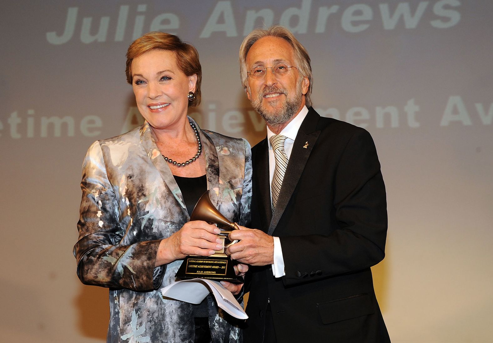 Andrews receives a Grammy Lifetime Achievement Award in 2011. She also won a Grammy that year for best spoken word album for children ("Julie Andrews' Collection of Poems, Songs and Lullabies"). She received her first Grammy in 1965, winning best recording for children ("Mary Poppins").