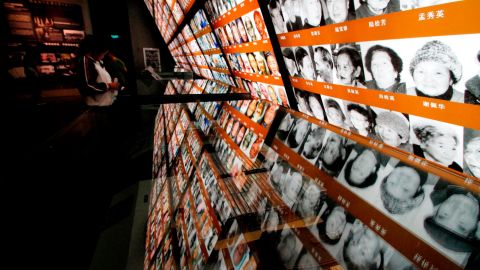 Photos of survivors are seen on display at the Nanjing Massacre Memorial Hall in Nanjing on October 10, 2015.  Japan on October 10 lashed out at UNESCO's decision to inscribe documents related to the Nanjing massacre in its Memory of the World register, describing it as "extremely regrettable" and calling for the process to be reformed.     CHINA OUT      AFP PHOTO / AFP PHOTO / STR        (Photo credit should read STR/AFP via Getty Images)