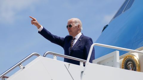 President Joe Biden gestures as he boards Air Force One for a trip to South Korea and Japan on May 19, 2022, in Andrews Air Force Base, Maryland.
