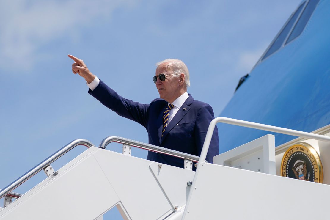 President Joe Biden gestures as he boards Air Force One for a trip to South Korea and Japan, May 19, 2022.