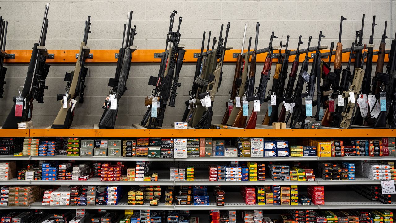 Rifles and ammunition for sale at Knob Creek Gun Range in West Point, Kentucky, in July 2021.
