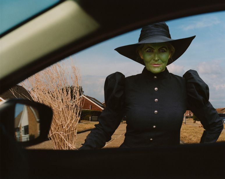 An exam invigilator and baby massage teacher by day, one of Redding's subjects assumes the character of the Wicked Witch of the West from "The Wizard of Oz."