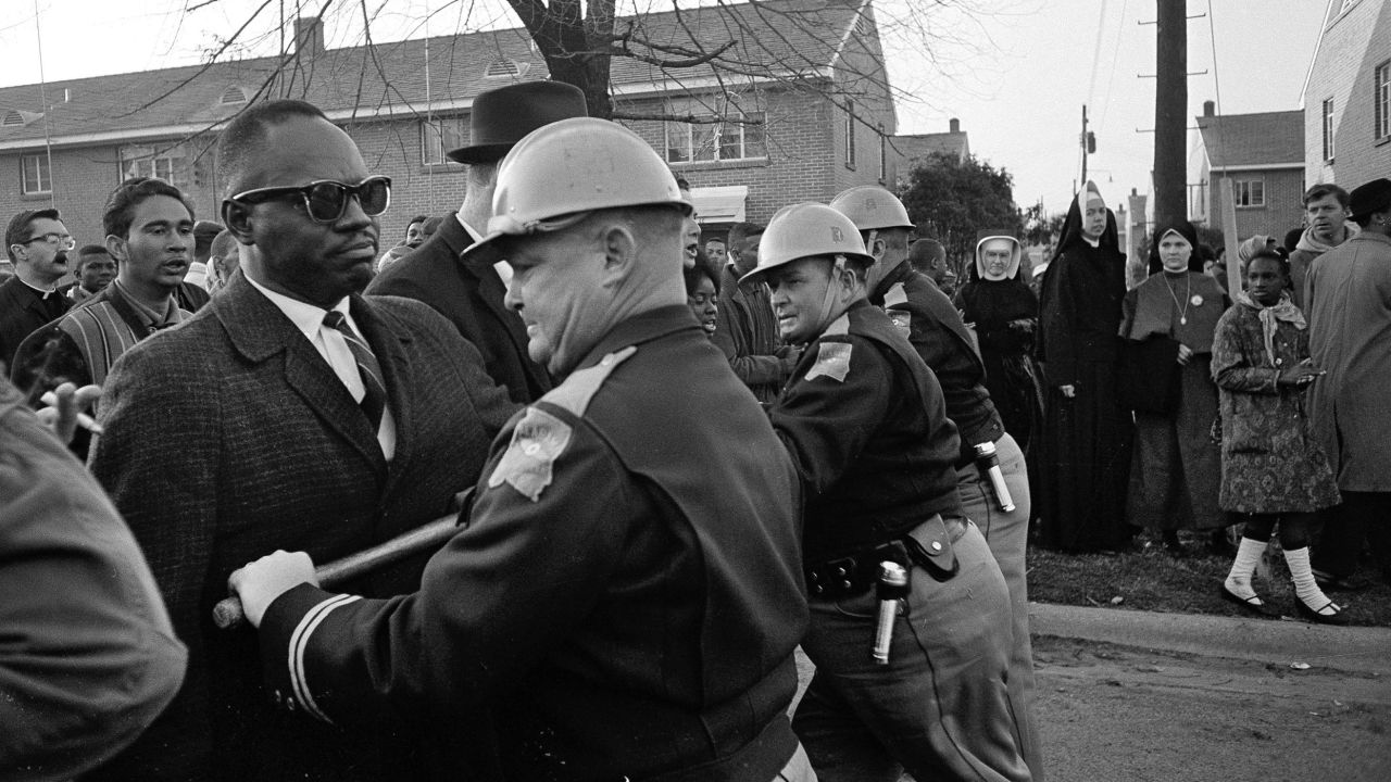 Police block demonstrators during a protest for voting rights in Selma, Alabama, on March 13, 1965.