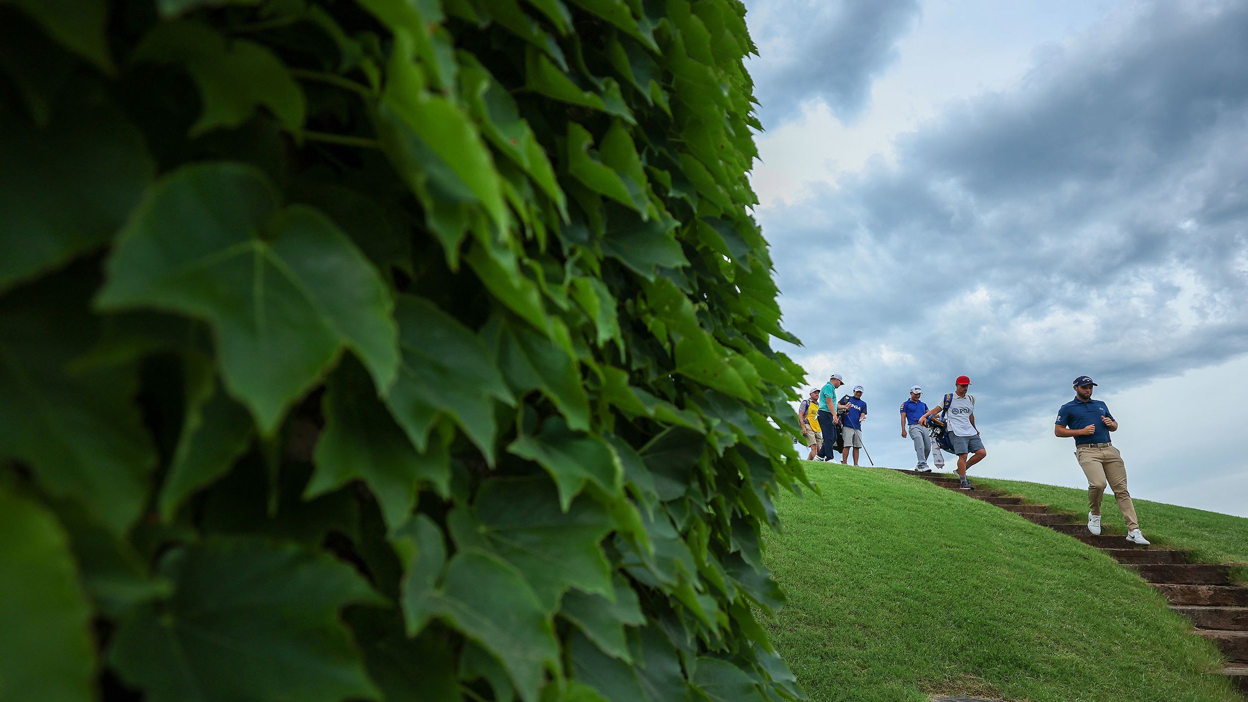 Adri Arnaus of Spain walks on the 10th hole during the first round.