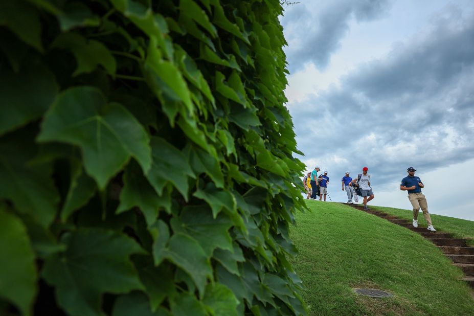 Adri Arnaus of Spain walks on the 10th hole during the first round.