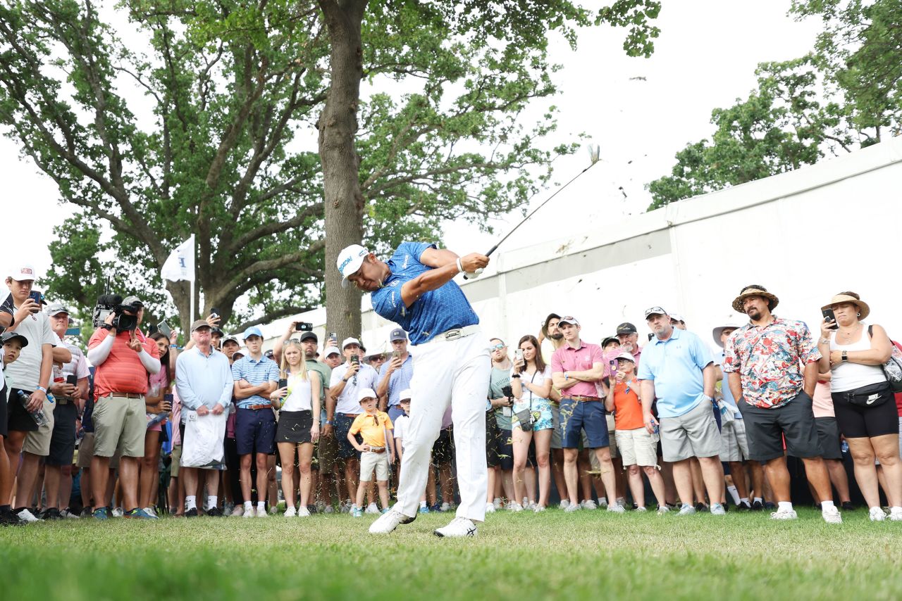 Hideki Matsuyama plays his shot from the 13th tee during the first round.
