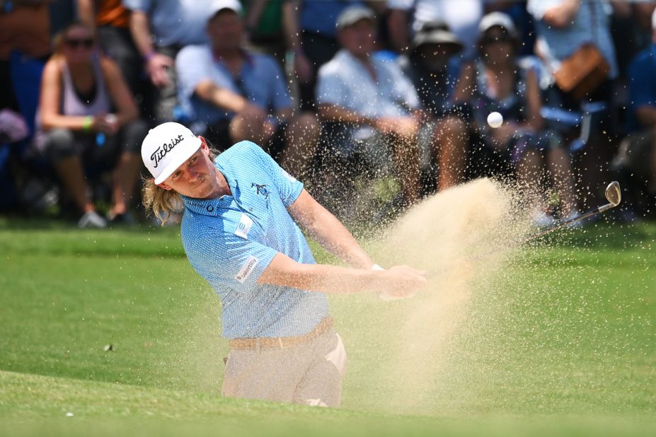 Cameron Smith plays a shot from a bunker on the eighth hole during the first round.