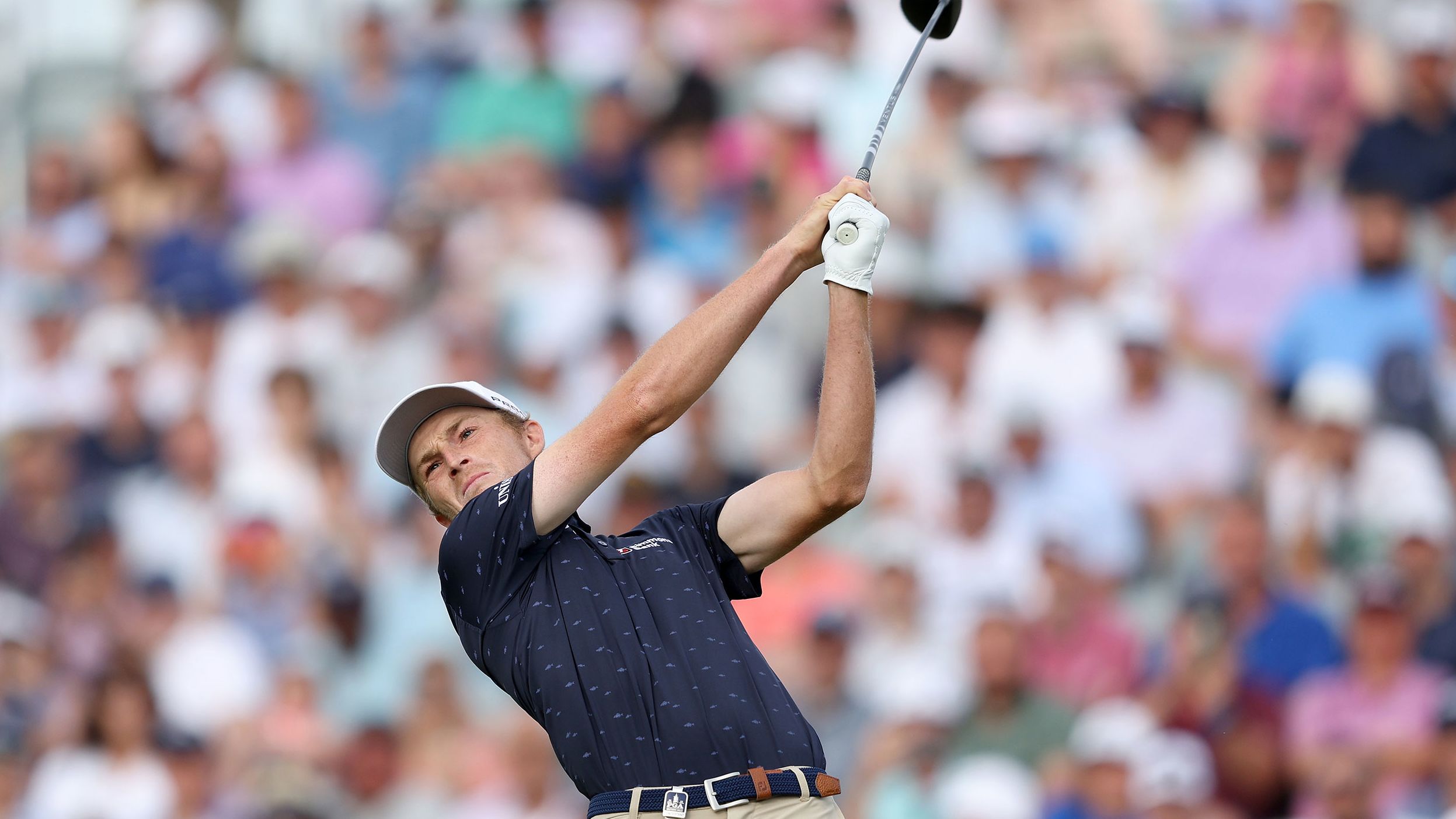 Will Zalatoris plays his shot from the 10th tee.