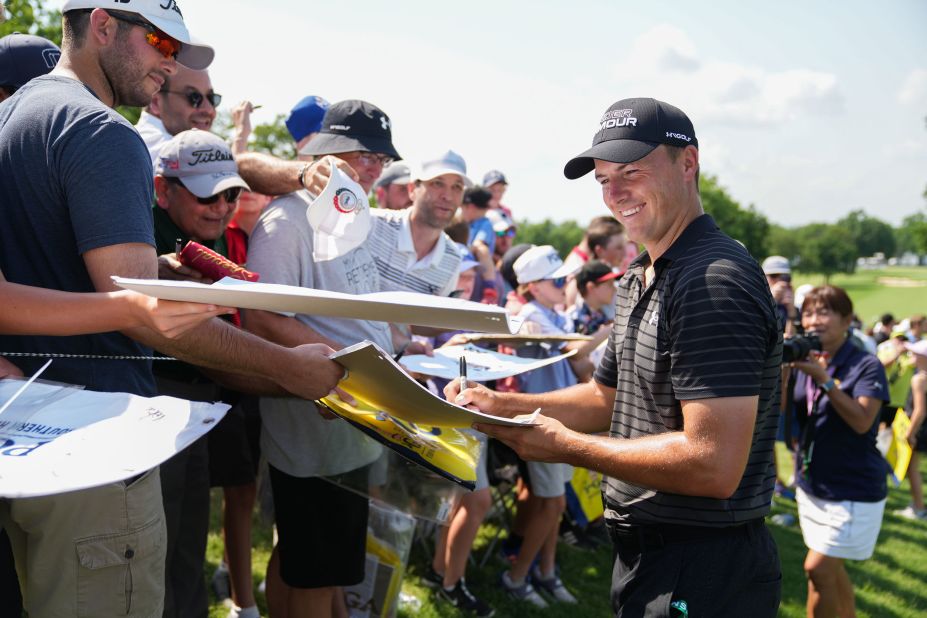 Jordan Spieth signs autographs during a practice round ahead of the 2022 PGA Championship.