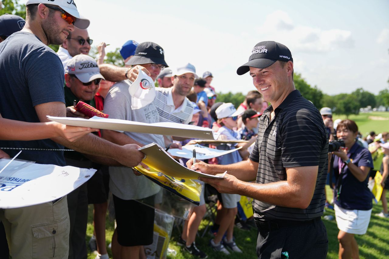 Jordan Spieth signs autographs during a practice round ahead of the 2022 PGA Championship.