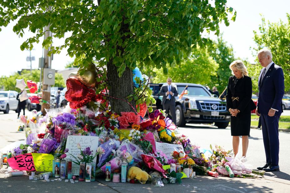 President Joe Biden and first lady Jill Biden pay their respects on Tuesday, May 17, at a makeshift memorial for the victims of Saturday's mass shooting in Buffalo, New York. President Biden on Tuesday <a href="https://www.cnn.com/2022/05/17/politics/biden-buffalo-visit-shooting/index.html" target="_blank">did not hesitate to call the deadly shooting an act of domestic terrorism,</a> condemning the racist ideology of the suspected shooter. "White supremacy is a poison. It's a poison ... running through our body politic," Biden said, adding that silence is "complicity."