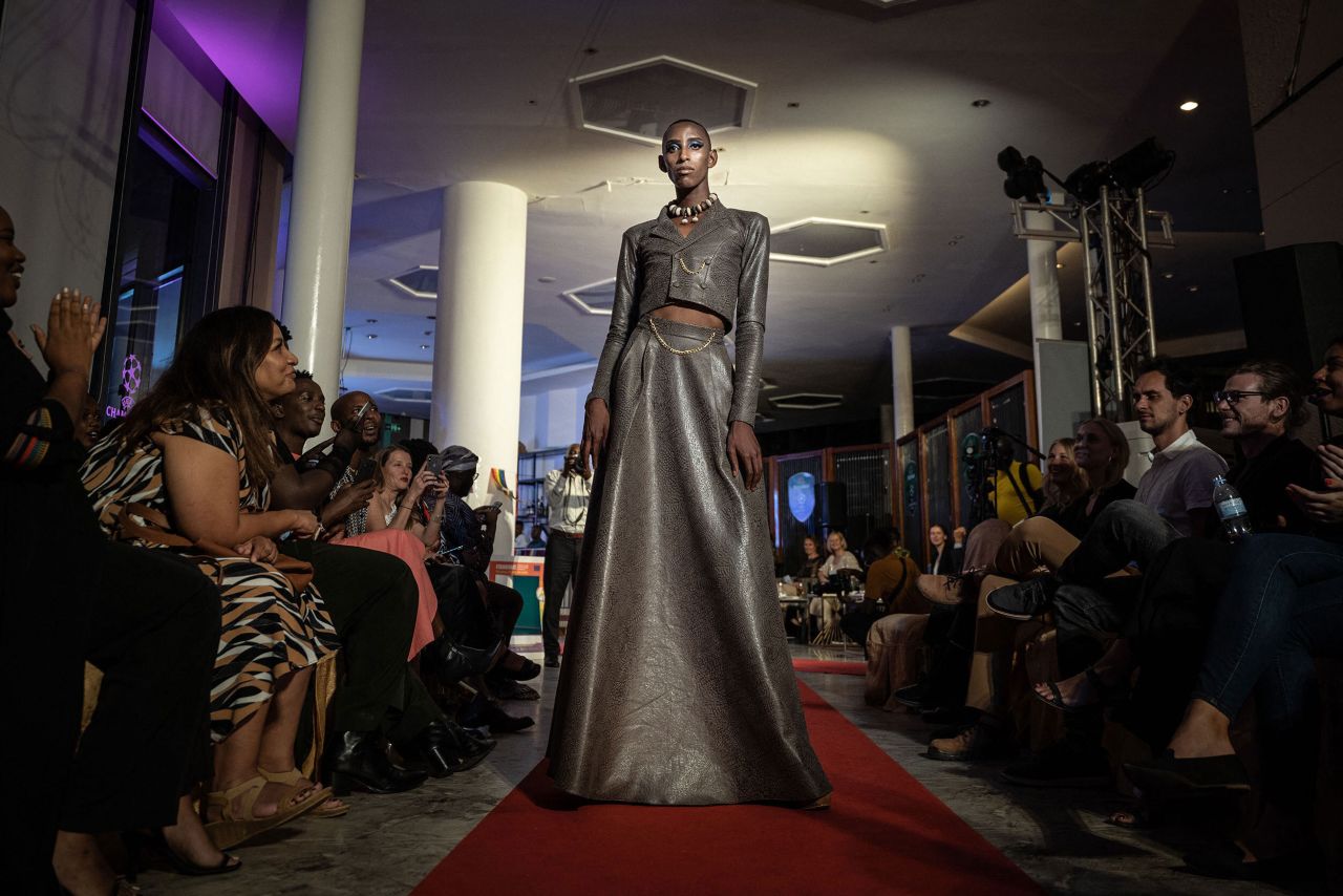 Rwandan model Prince walks the runway during the Isano Fashion Show in Kigali, Rwanda, on Tuesday, May 17. The show features models from the LGBTQ community and Rwandans with disabilities to celebrate the International Day Against Homophobia, Transphobia and Biphobia.