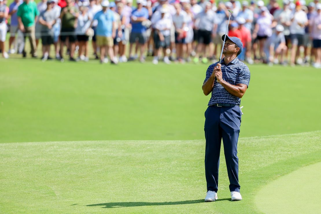 Woods reacts on the 18th green during the first round of the 2022 PGA Championship.