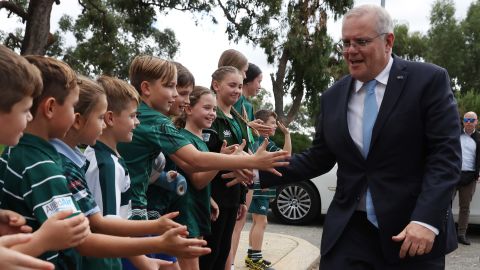 Prime Minister Scott Morrison greets the children of Wanneroo Rugby Union Club in Perth on May 20.