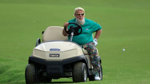 Daly makes his way down the fairway in his cart during the first round of the 2022 PGA Championship.