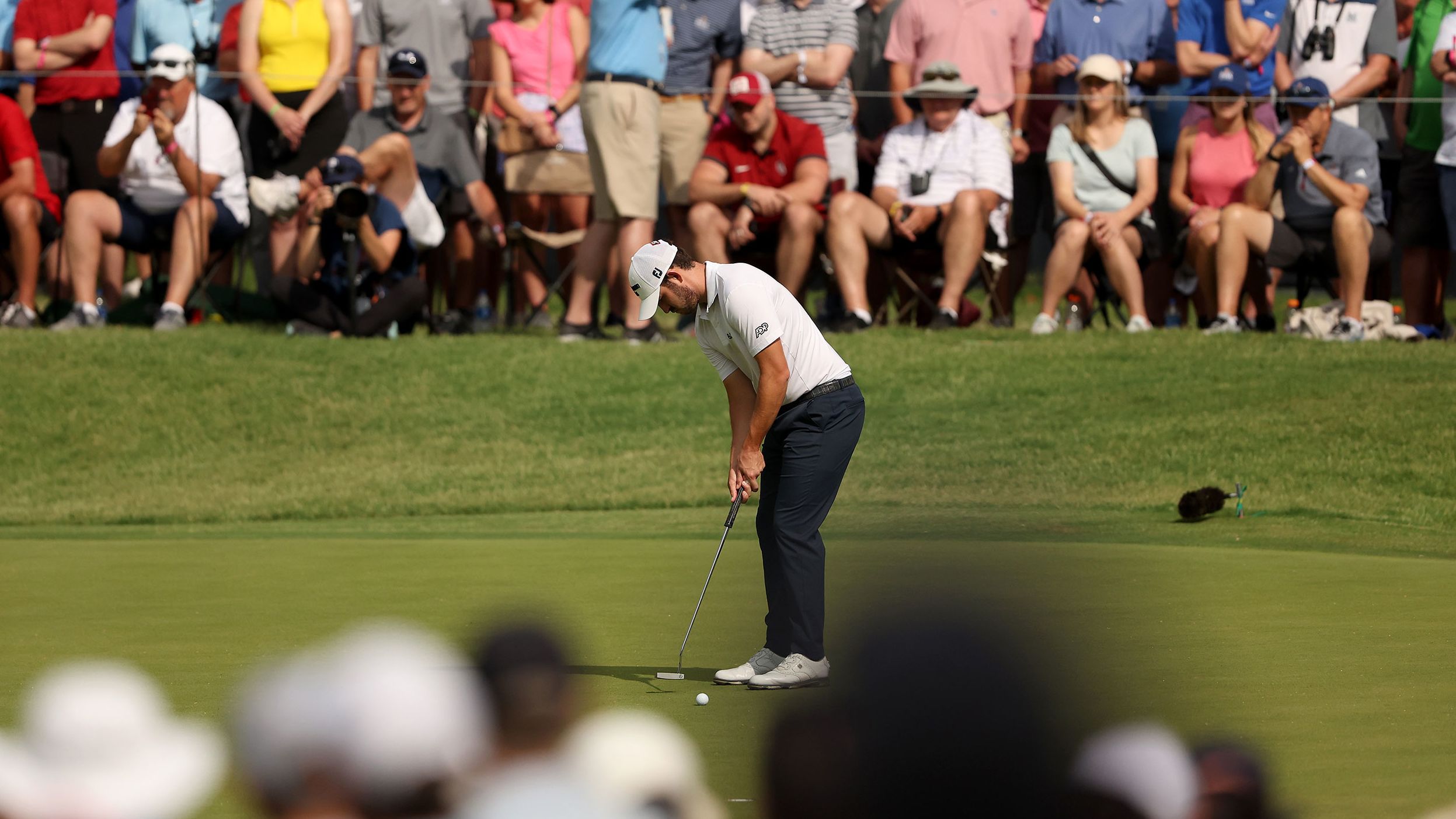 Patrick Cantlay putts on the 15th green during the second round.