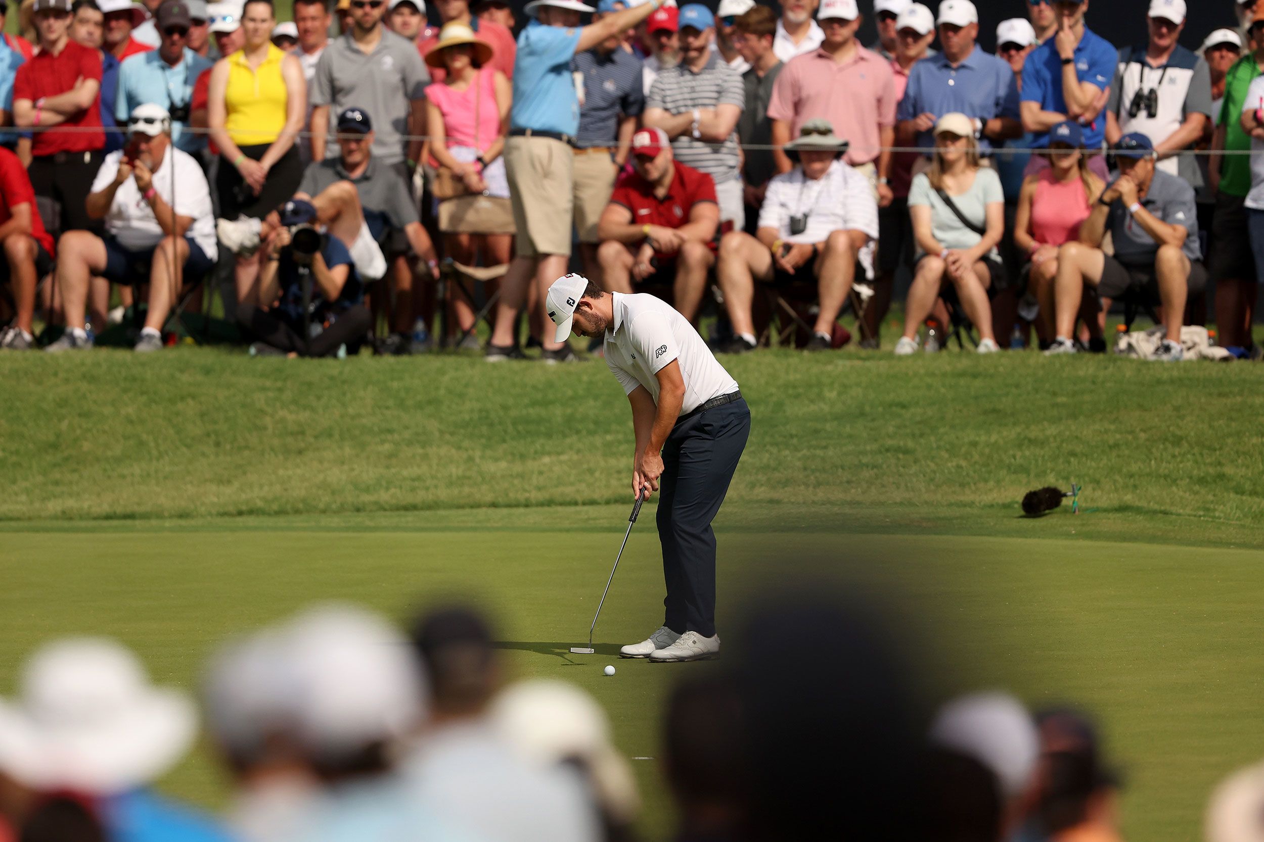 Patrick Cantlay putts on the 15th green during the second round.