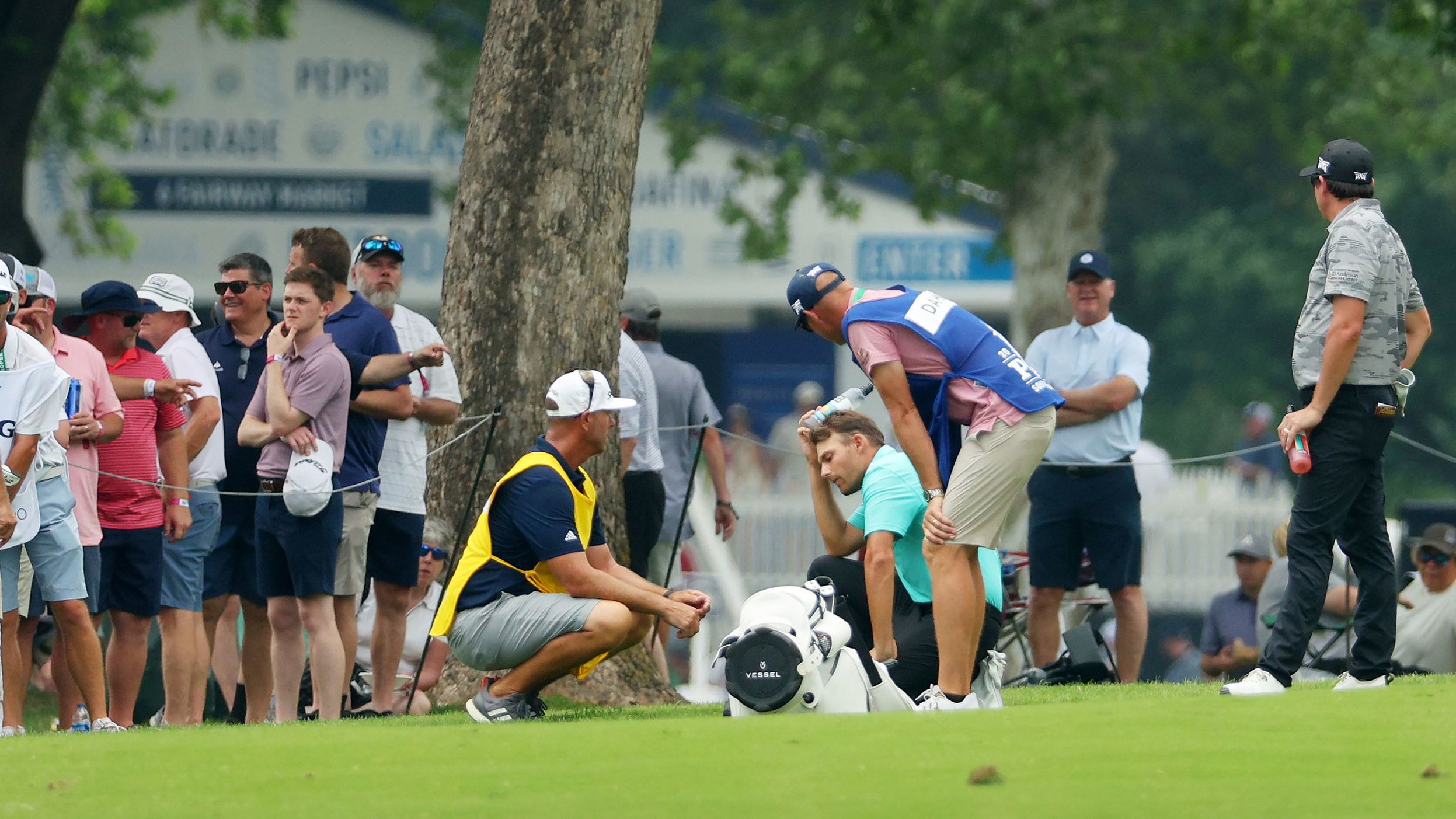 <a href="index.php?page=&url=https%3A%2F%2Fedition.cnn.com%2F2022%2F05%2F20%2Fgolf%2Faaron-wise-hit-with-ball-pga-championship-spt-intl%2Findex.html" target="_blank">Aaron Wise</a> kneels on the seventh hole after being hit by a ball played by Cameron Smith during the second round.