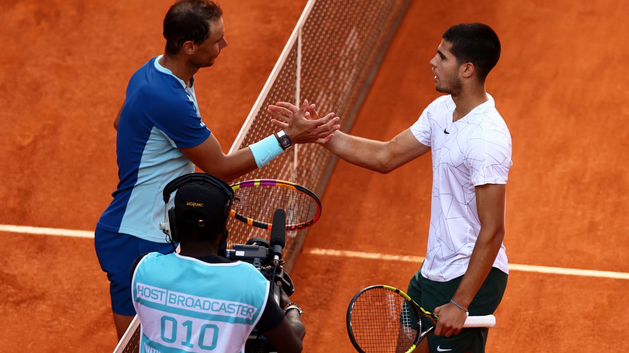 Alcaraz (right) beat Nadal in three sets in the quarterfinals of the Madrid Open earlier this month.