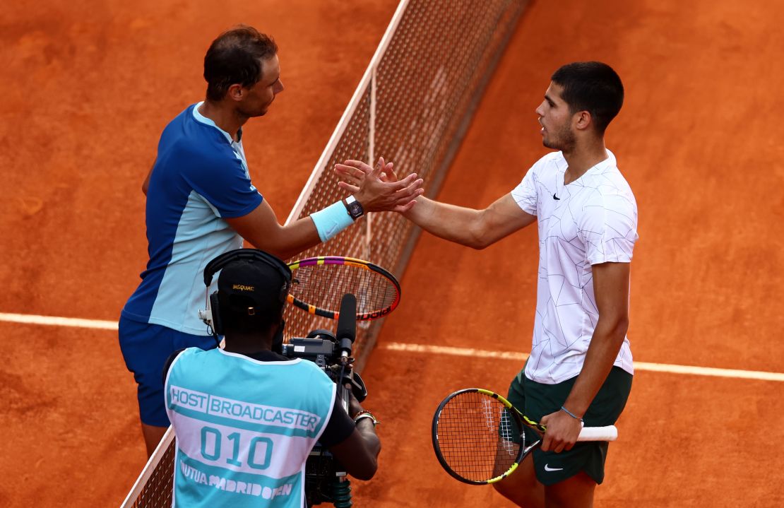 Alcaraz (right) beat Nadal in three sets in the quarterfinals of the Madrid Open earlier this month.