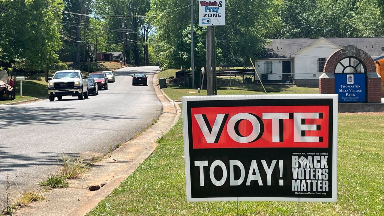 A voting sign outside the Breakthrough Deliverance Church in Griffin, Georgia.