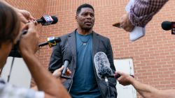 Herschel Walker, US Republican Senate candidate for Georgia, speaks to members of the media following a campaign rally in Macon, Georgia, US, on Wednesday, May 18, 2022. Heisman Trophy-winner Walker is vying to face incumbent Democratic Senator Raphael Warnock in his first political run.