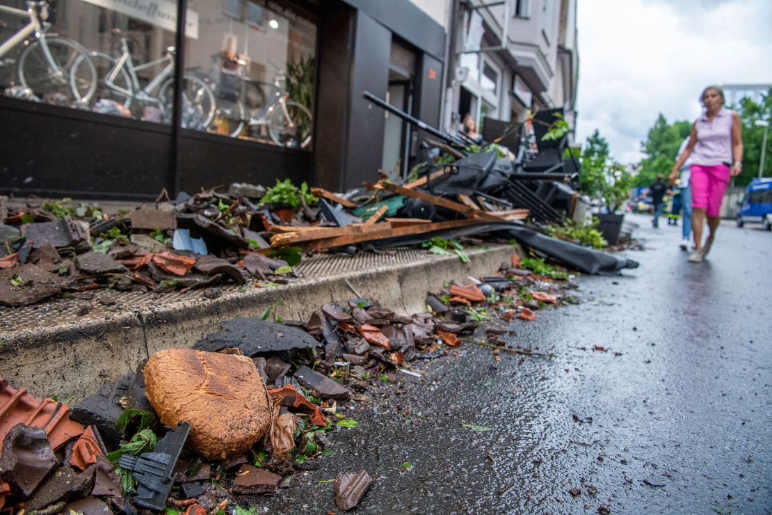 A loaf of bread lies among the debris on the edge of a downtown street in Paderborn on May 20, 2022.
