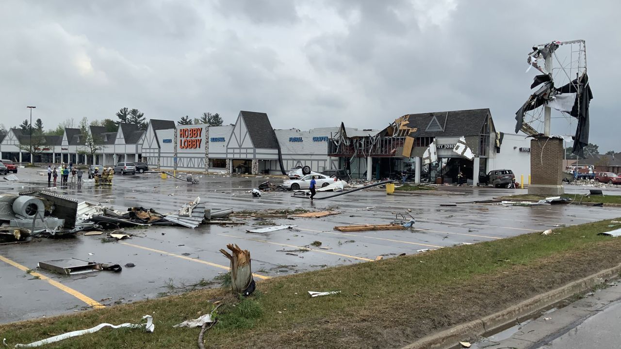 A photo posted to Twitter by the Michigan State Patrol shows tornado damage to a shopping center in the town of Gaylord.