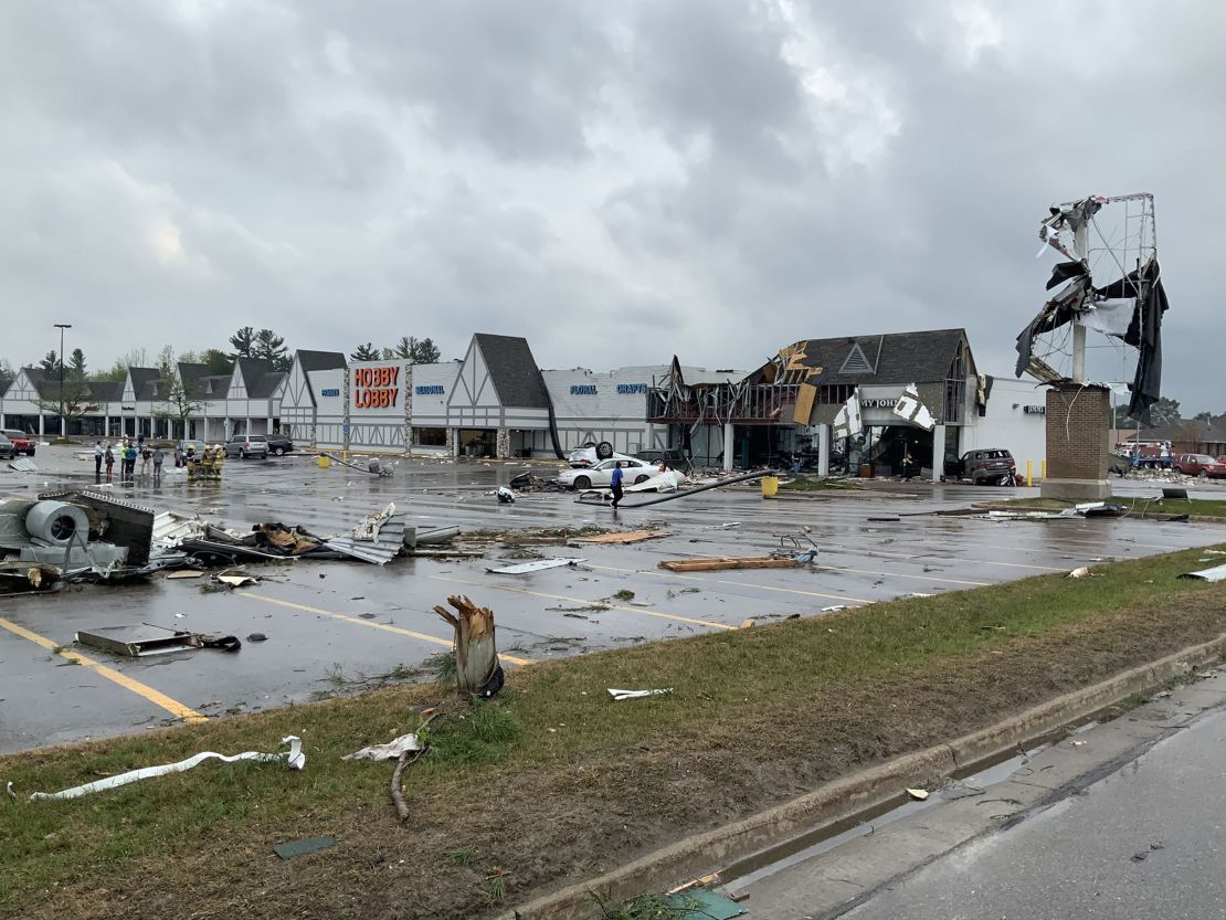 A photo posted to Twitter by the Michigan State Patrol shows tornado damage to a shopping center in the town of Gaylord.