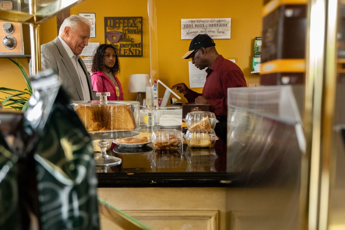 Frank DeRiso, president of the United Food Commercial Workers Union Local 1, orders from Golden Cup Coffee Company co-owner Larry Stitts. The union represents all 75 Tops employees.