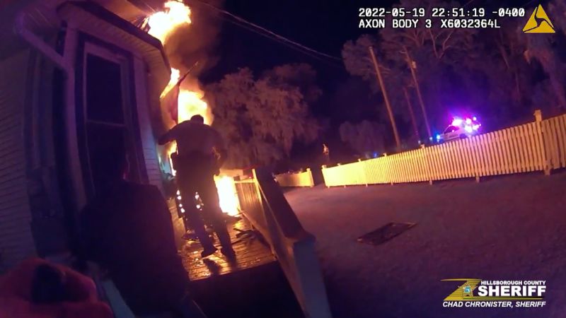 Florida deputies save 9-year-old by pulling him through the window of a burning home | CNN