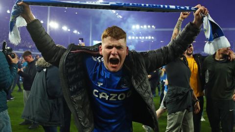 An Everton fan celebrates at full-time following Everton's victory against Crystal Palace.