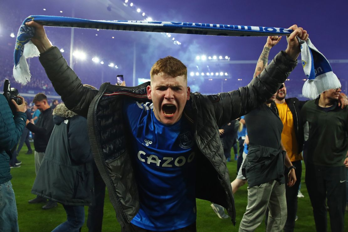 An Everton fan celebrates at full-time following Everton's victory against Crystal Palace.