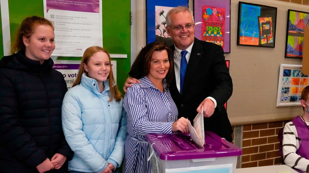 Australian Prime Minister Scott Morrison and his wife Jenny cast their votes at a polling booth in Sydney on Saturday.
