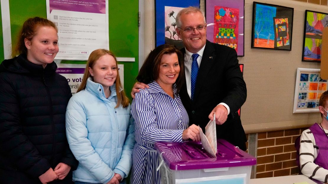 Australian Prime Minister Scott Morrison and his wife Jenny cast their votes at a polling booth in Sydney on Saturday.