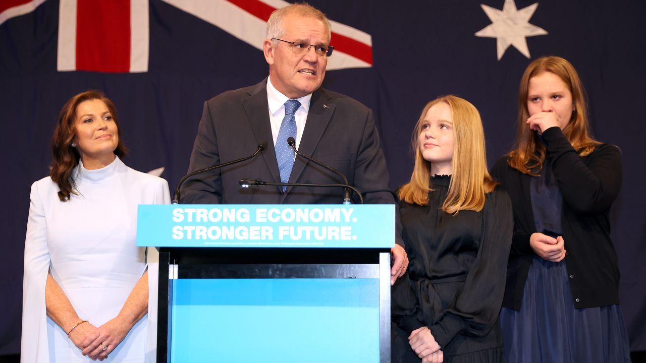 Scott Morrison, flanked by his wife and daughters as he concede defeat to Labor leader Anthony Albanese.