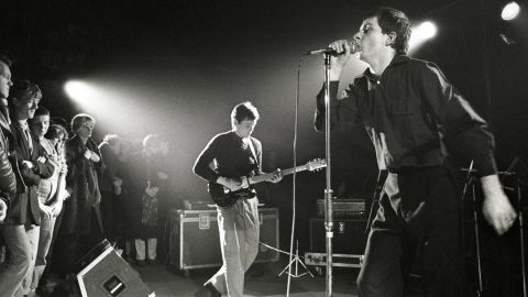 Joy Division performing live in Rotterdam before the death of lead singer Ian Curtis.