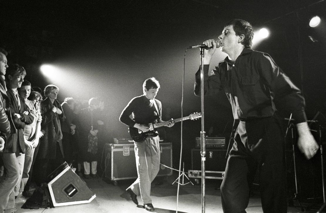 Joy Division performing live in Rotterdam before the death of lead singer Ian Curtis.