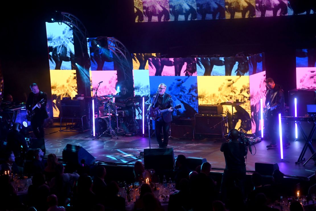 New Order perform on stage at the Music Industry Trust Awards in 2021.