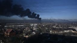 Black smoke rises from a military airport in Chuguyev near Kharkiv  on February 24, 2022.