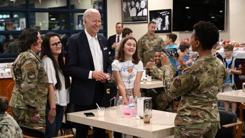 US President Joe Biden speaks with members of the US military and their families while visiting the bowling alley at Osan Air Base in Pyeongtaek on May 22, 2022. 