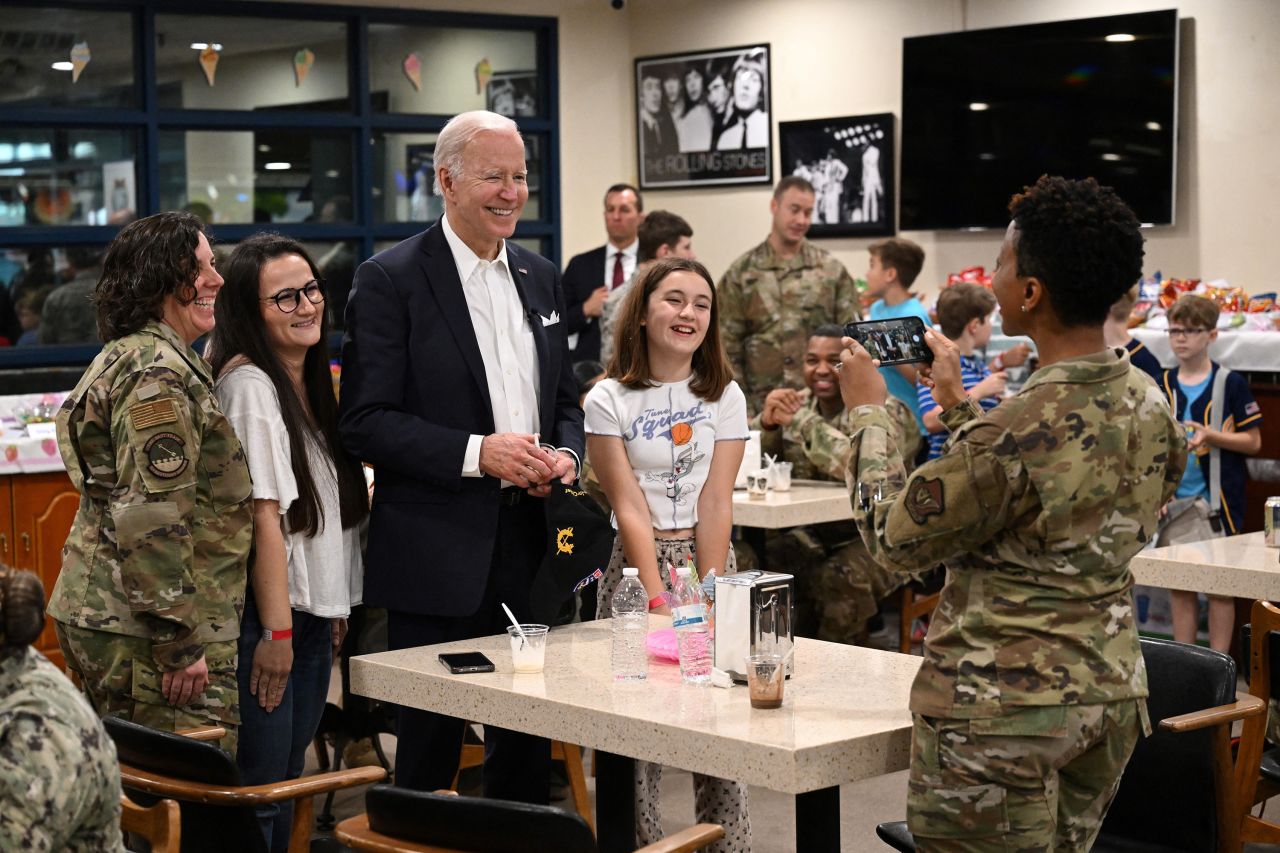 Biden speaks with members of the US military and their families while visiting Osan Air Base in Pyeongtaek, South Korea, on Sunday, May 22.