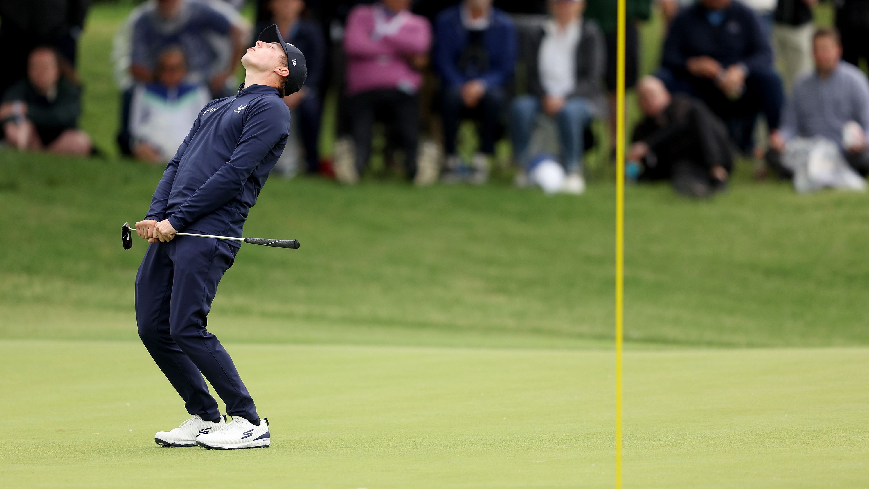 Matt Fitzpatrick reacts to a missed birdie putt on the 15th green during the third round.
