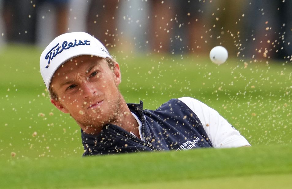 Will Zalatoris plays his shot from the bunker on the first green during the third round.